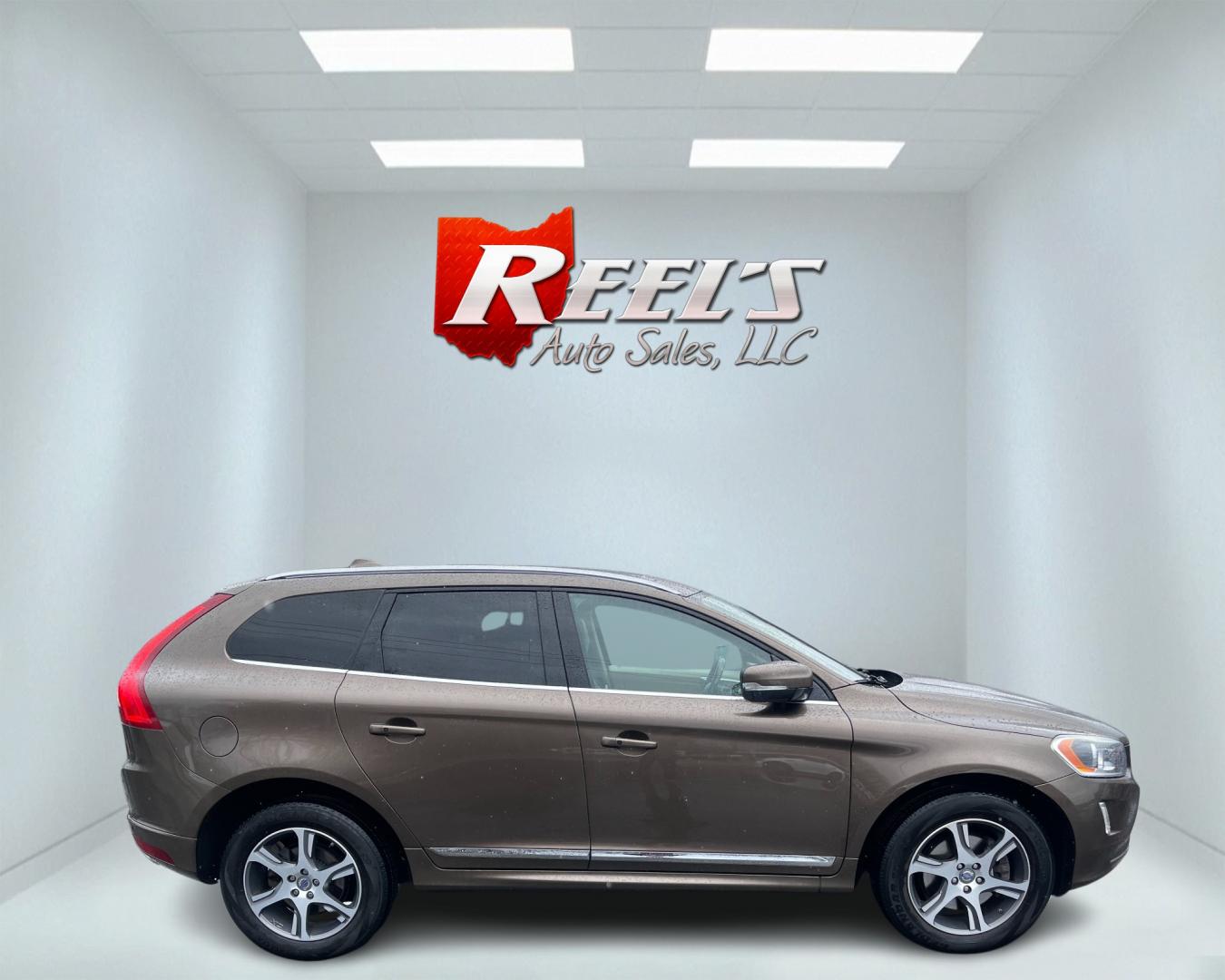 2015 Brown /Tan Volvo XC60 T6 Premium Plus (YV4902RC5F2) with an 3.0L I6 24V DOHC Turbo engine, 6-Speed Automatic transmission, located at 11115 Chardon Rd. , Chardon, OH, 44024, (440) 214-9705, 41.580246, -81.241943 - Photo#4